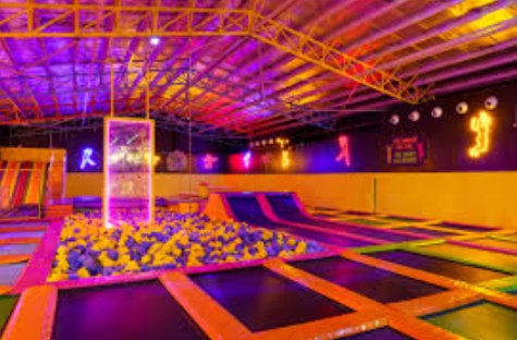 Kids playing on trampolines